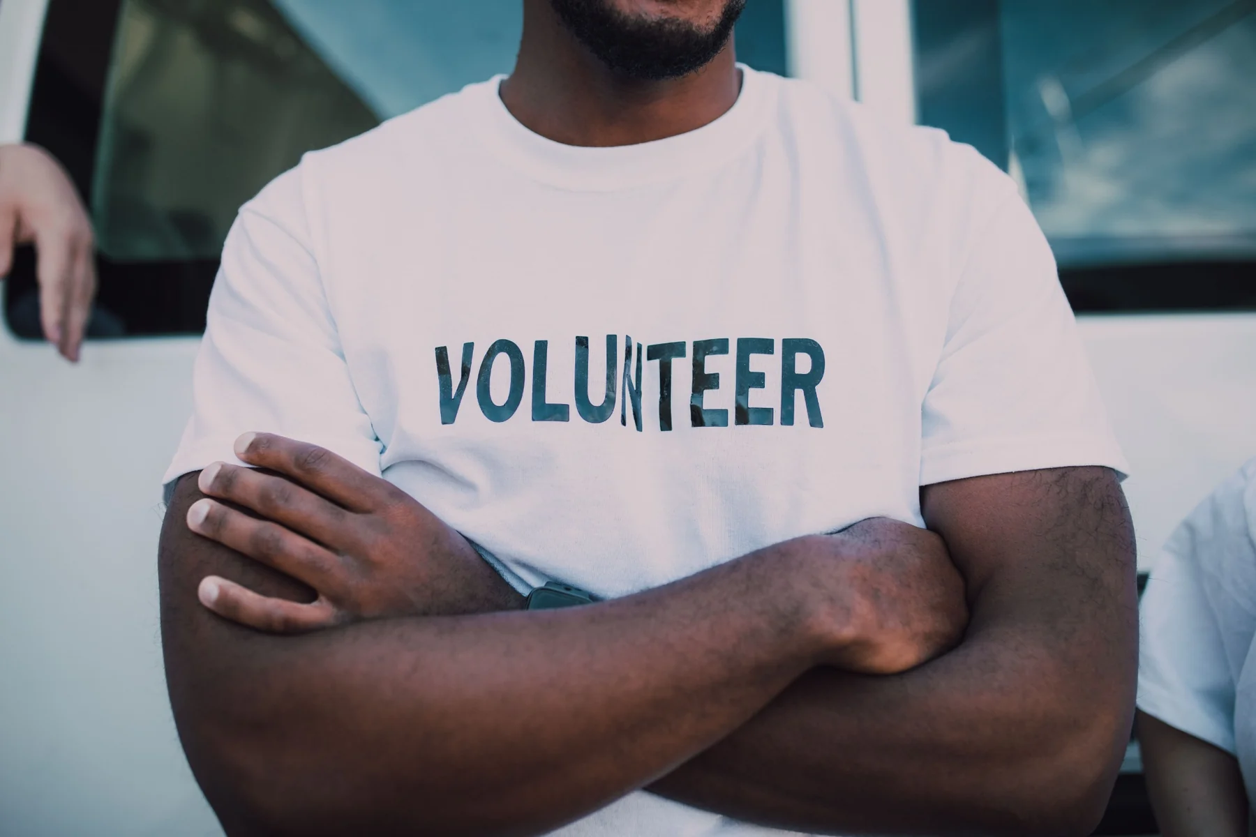 Diverse community creatives joining hands